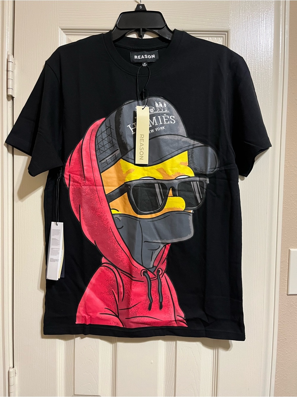 Reason Black Tee with Red Hoodie and Yellow Face Graphic